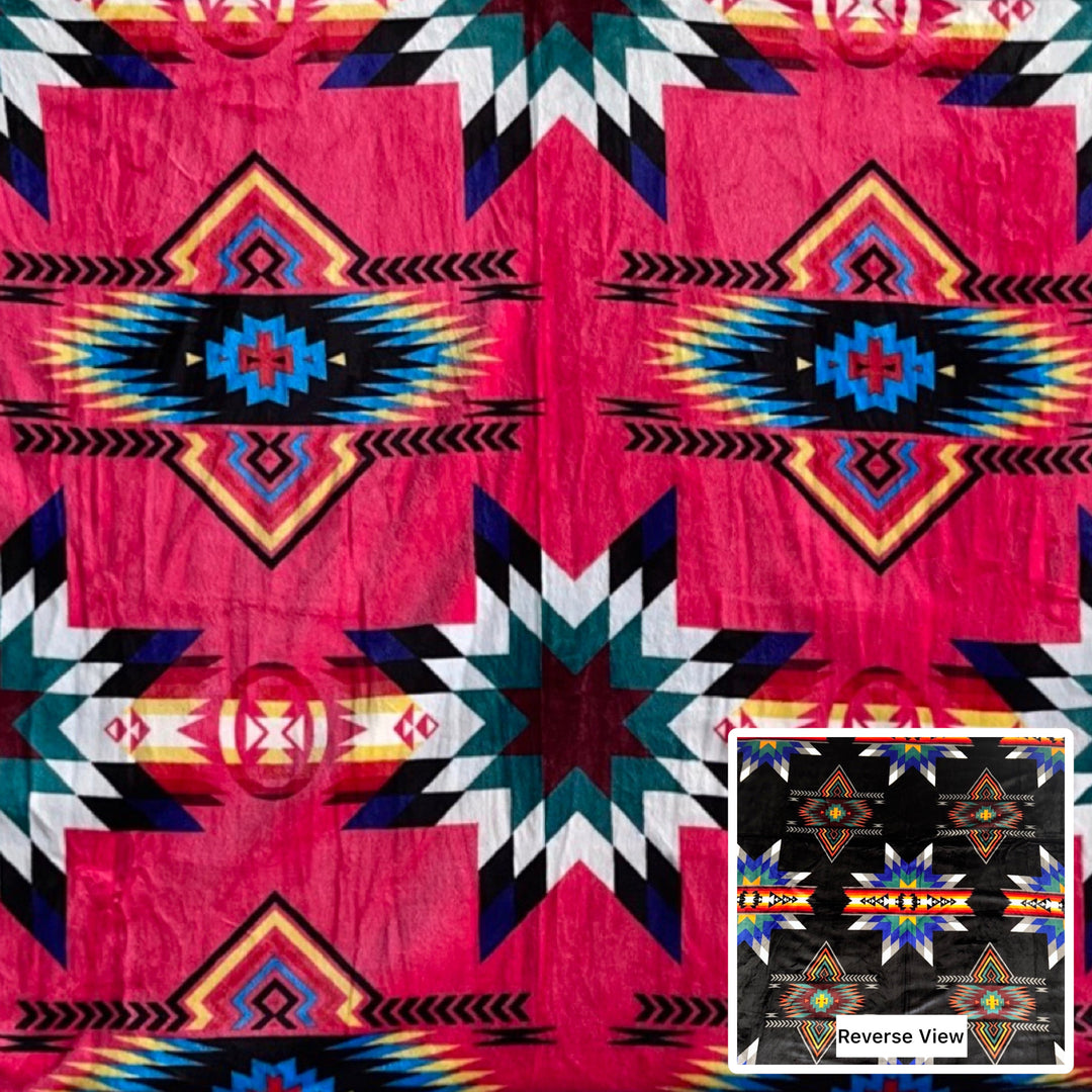 All Nations Designs &amp; More reversible blanket featuring a vibrant pink geometric starburst pattern on soft polyester