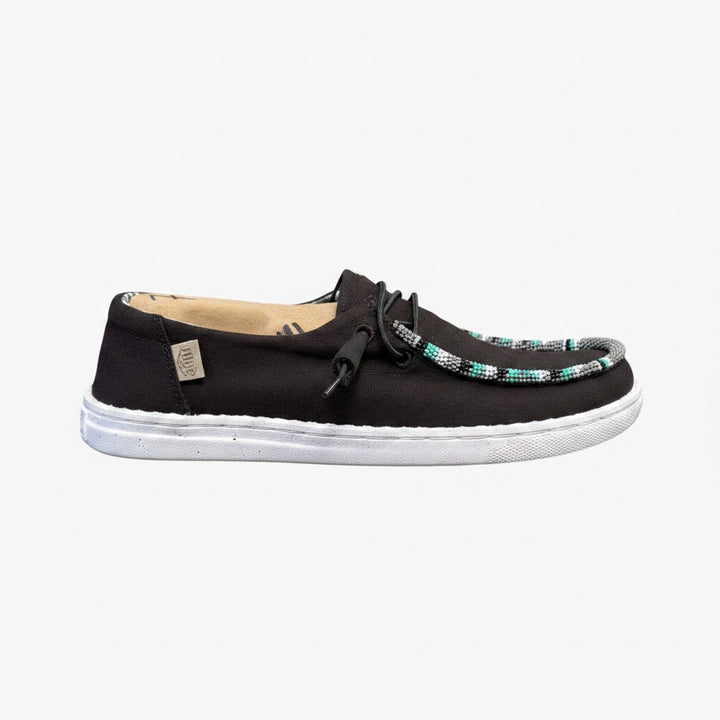 All Nations Designs &amp; More black mesh Hey Dude slip-on shoes featuring unique hand-beaded turquoise and white detailing.
