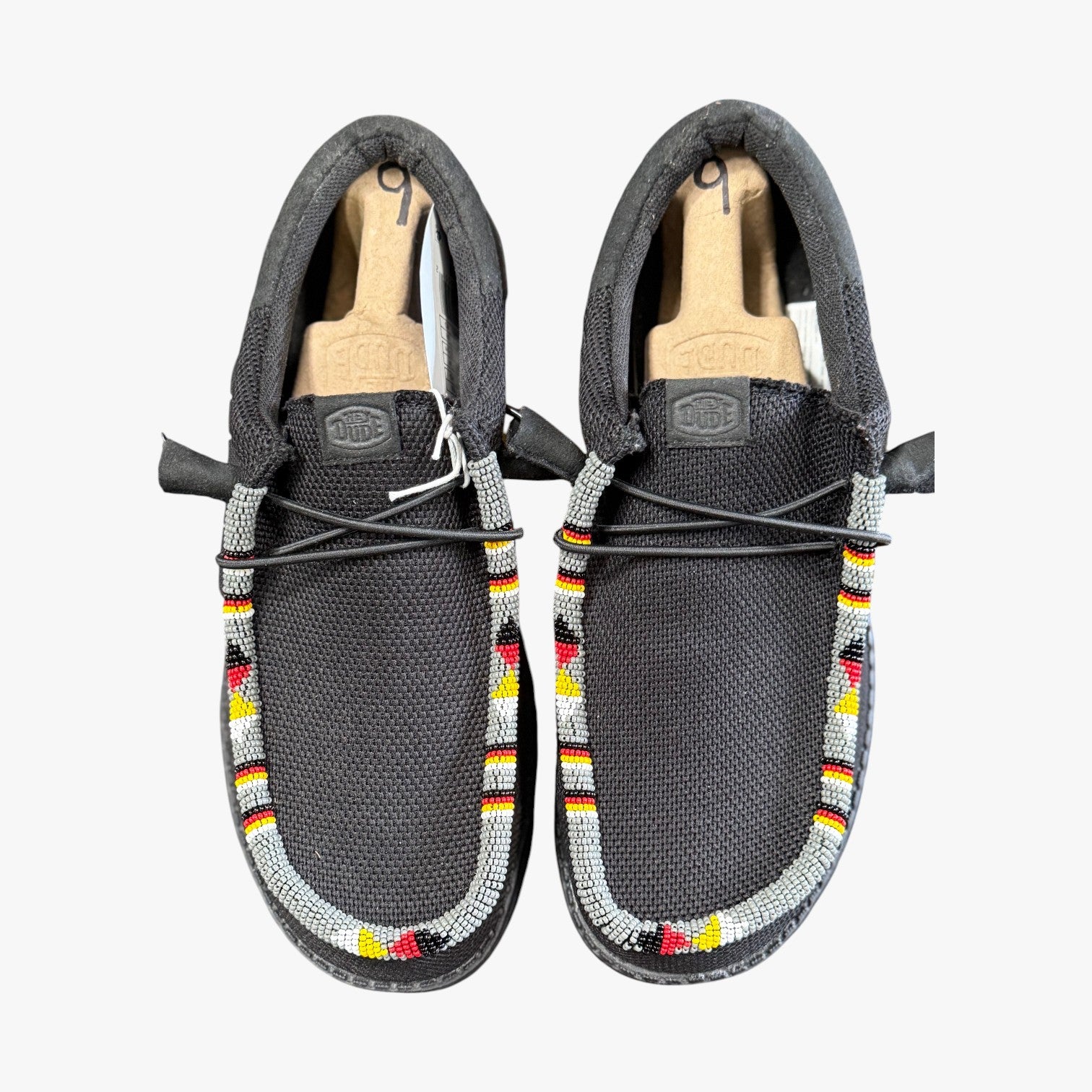 All Nations Designs & More men's black mesh Hey Dude slip-on shoes featuring traditional hand-beaded trim details.
