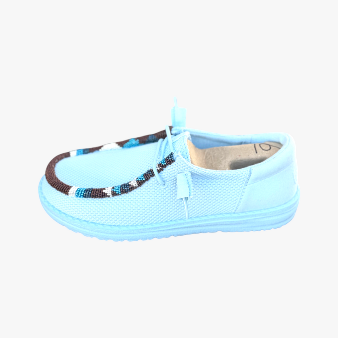 All Nations Designs &amp; More hand-beaded light blue mesh slip-on shoe with brown and white patterned beadwork trim.