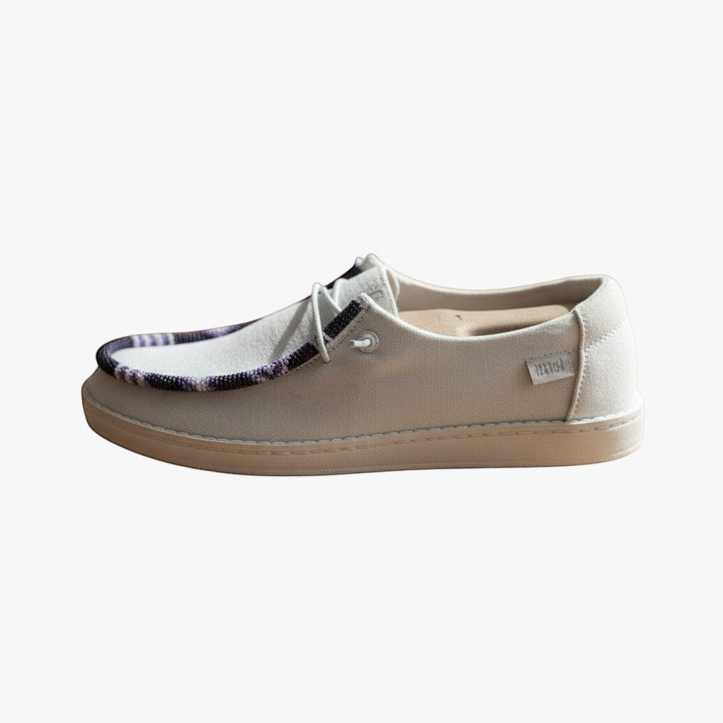 All Nations Designs &amp; More glitter white Hey Dude slip-on shoes featuring unique hand-beaded purple and white trim.