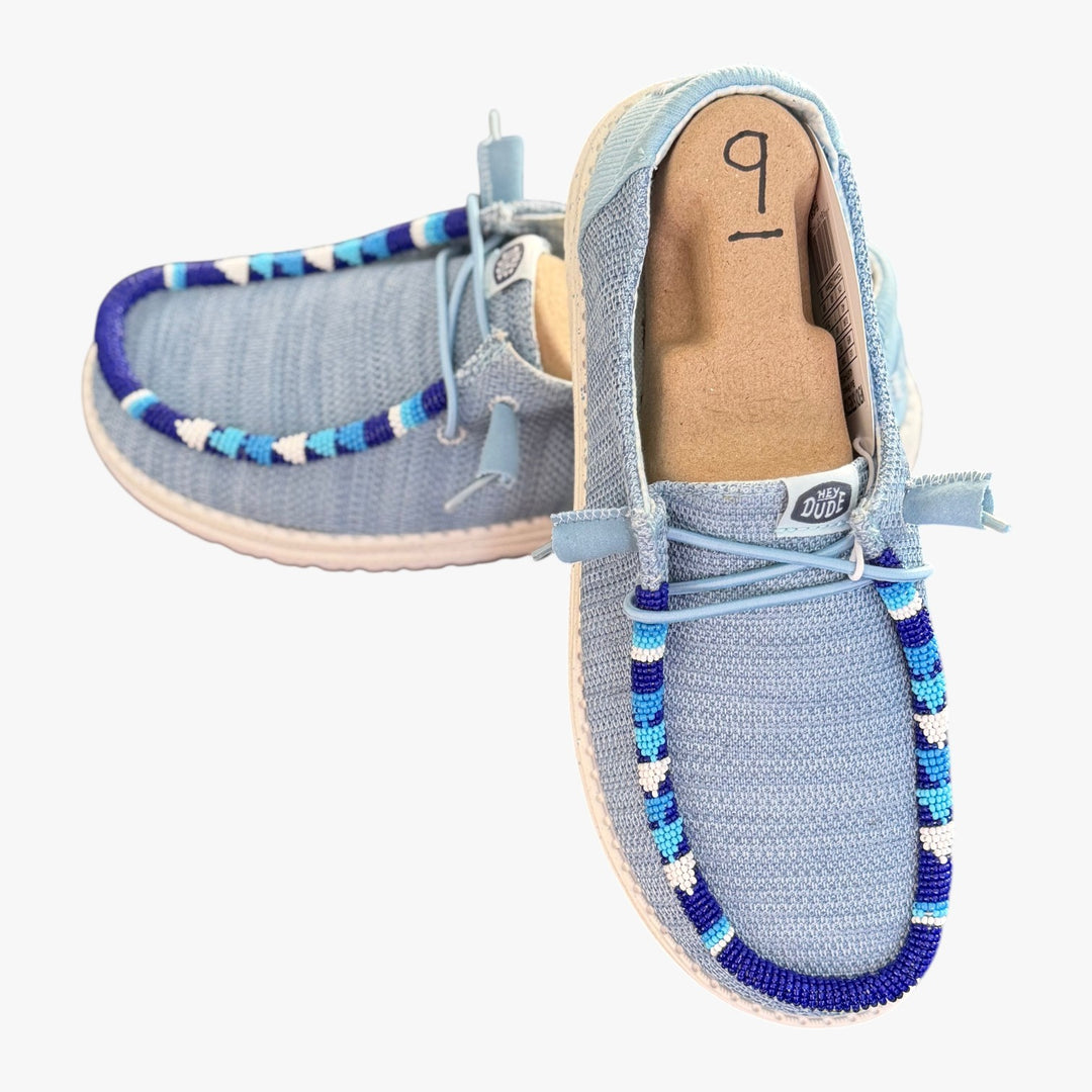 All Nations Designs &amp; More hand-beaded gray and blue mesh Hey Dude slip-on shoes with unique western-style beadwork.