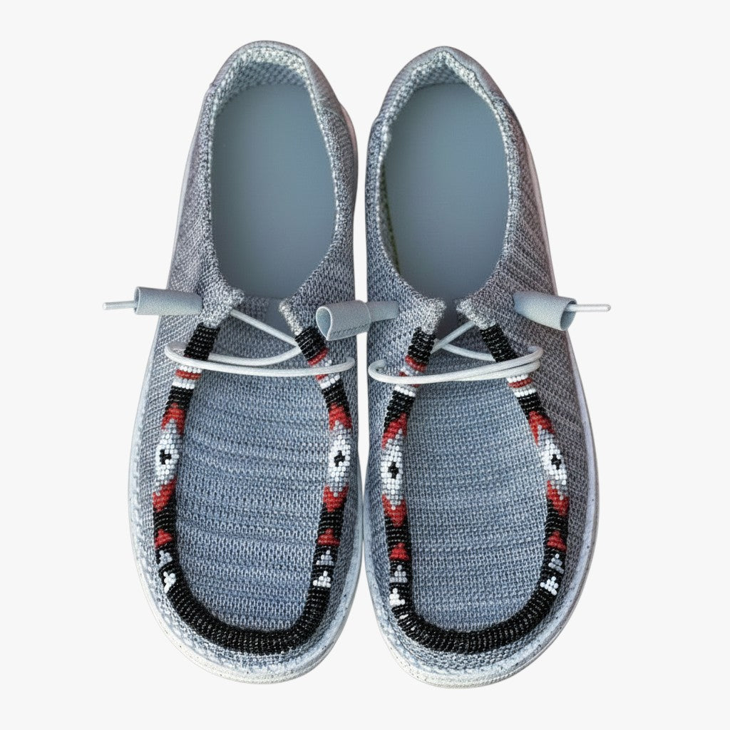 All Nations Designs &amp; More light gray Hey Dude slip-on shoes featuring custom hand-beaded western-style detailing.