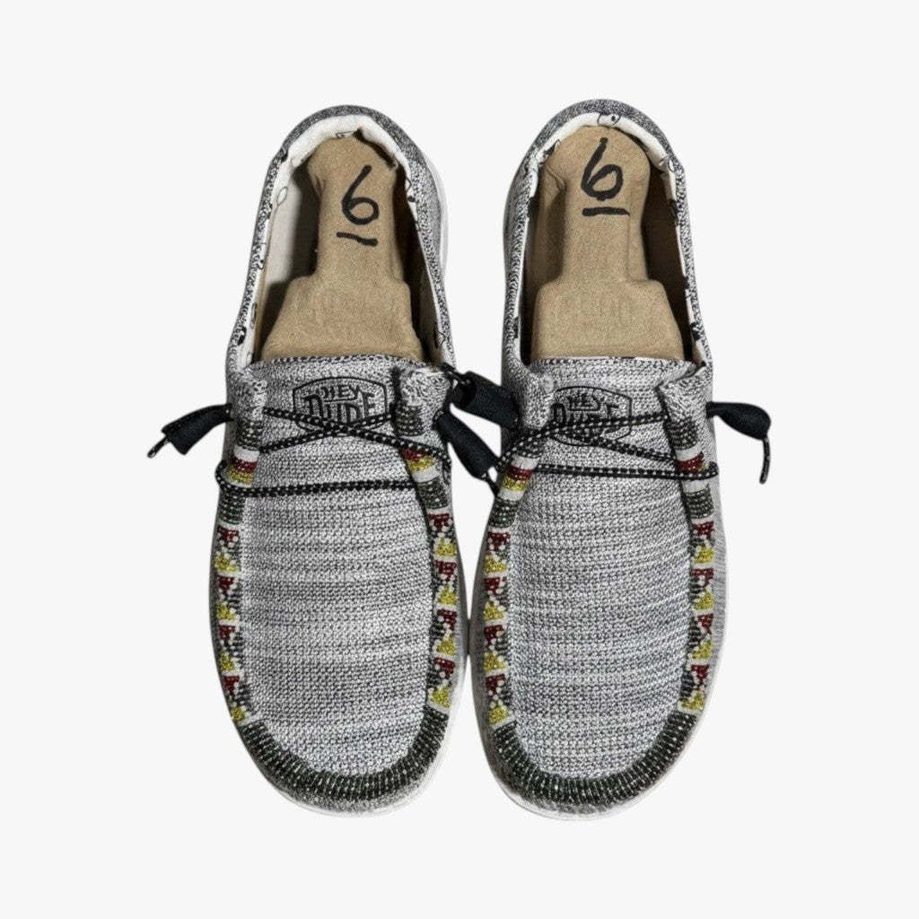 All Nations Designs & More grey mesh Hey Dude slip-on shoes with intricate hand-beaded trim and bungee lacing.