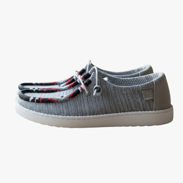 All Nations Designs &amp; More light gray Hey Dude slip-on shoes featuring custom hand-beaded western-style detailing.