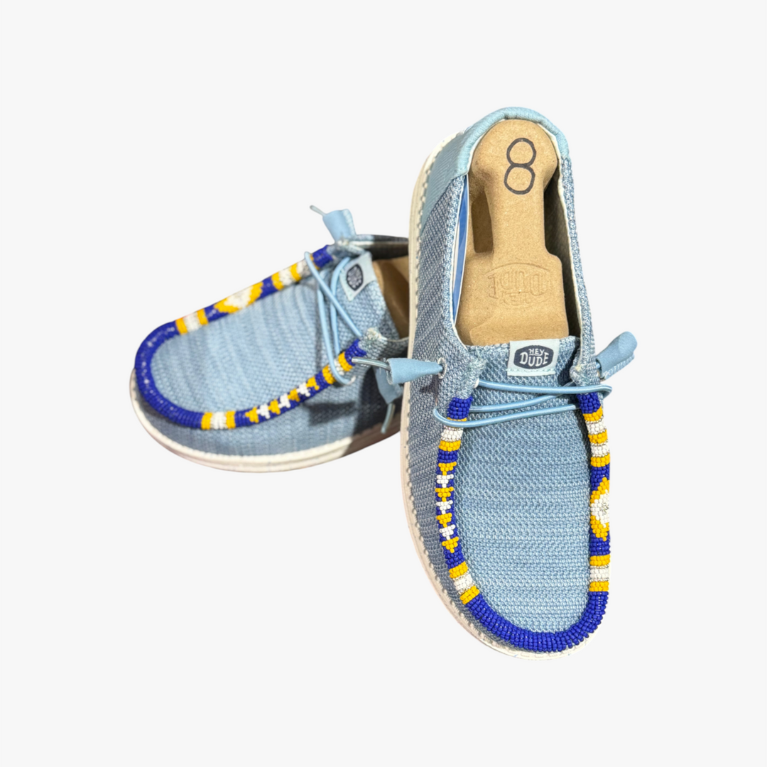 All Nations Designs &amp; More hand-beaded Hey Dude Mesh Blue Breeze slip-on shoes with yellow and white bead accents.