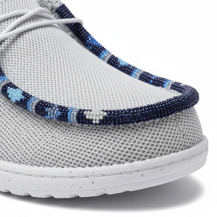 All Nations Designs &amp; More gray mesh slip-on shoes featuring custom blue and white hand-beaded western-style trim.