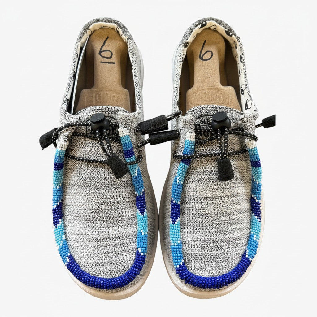 All Nations Designs &amp; More hand-beaded gray and blue mesh slip-on shoes with unique western-inspired beadwork.