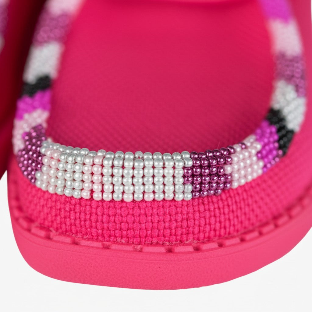All Nations Designs &amp; More electric pink mesh slip-on shoes featuring custom hand-beaded trim in pink and white.