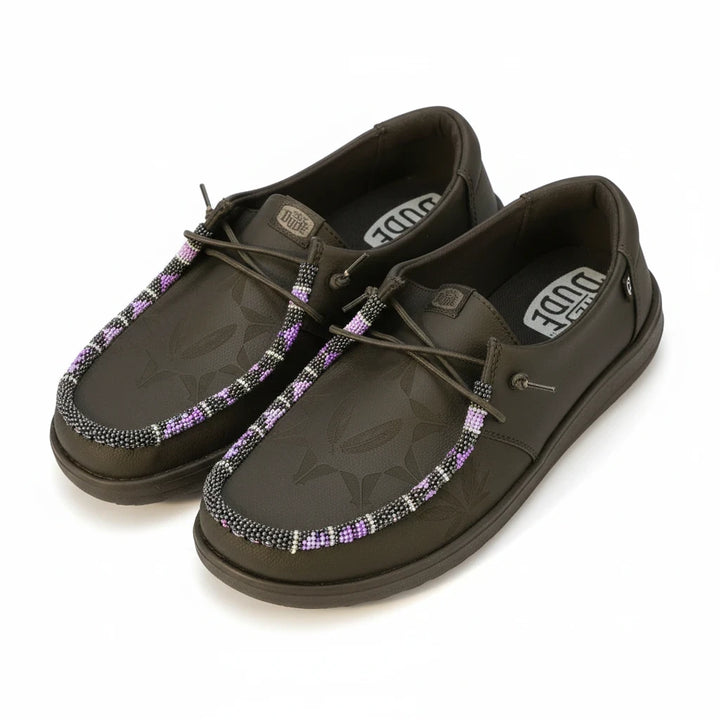 All Nations Designs &amp; More black leather Hey Dude slip-on shoes featuring unique hand-beaded teepee pattern detailing.