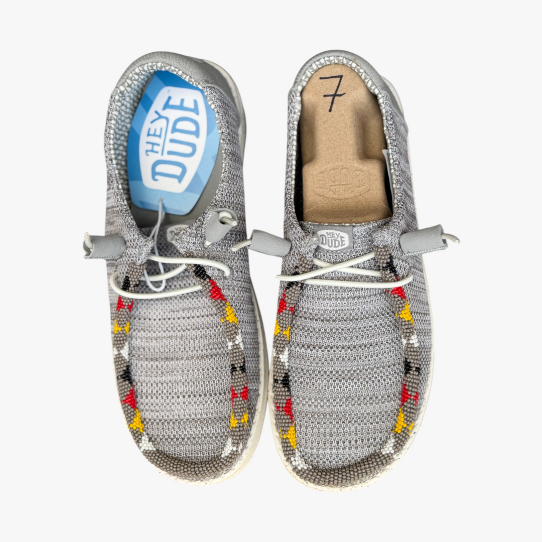 All Nations Designs &amp; More gray mesh Hey Dude slip-on shoes featuring unique hand-beaded western-inspired patterns.