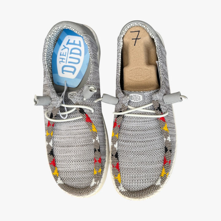 All Nations Designs &amp; More gray mesh Hey Dude slip-on shoes featuring unique hand-beaded western-inspired patterns.