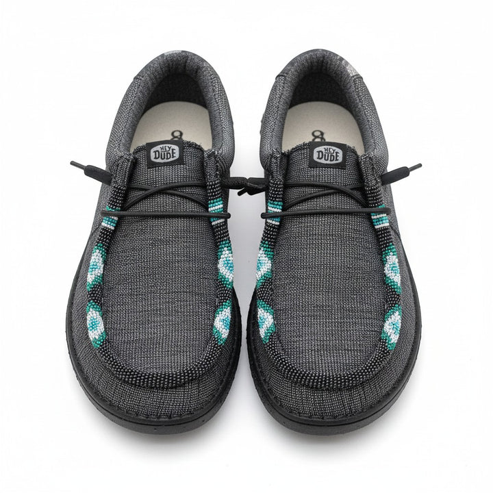 All Nations Designs &amp; More gray Hey Dude slip-on shoes featuring custom turquoise and white hand-beaded detailing.
