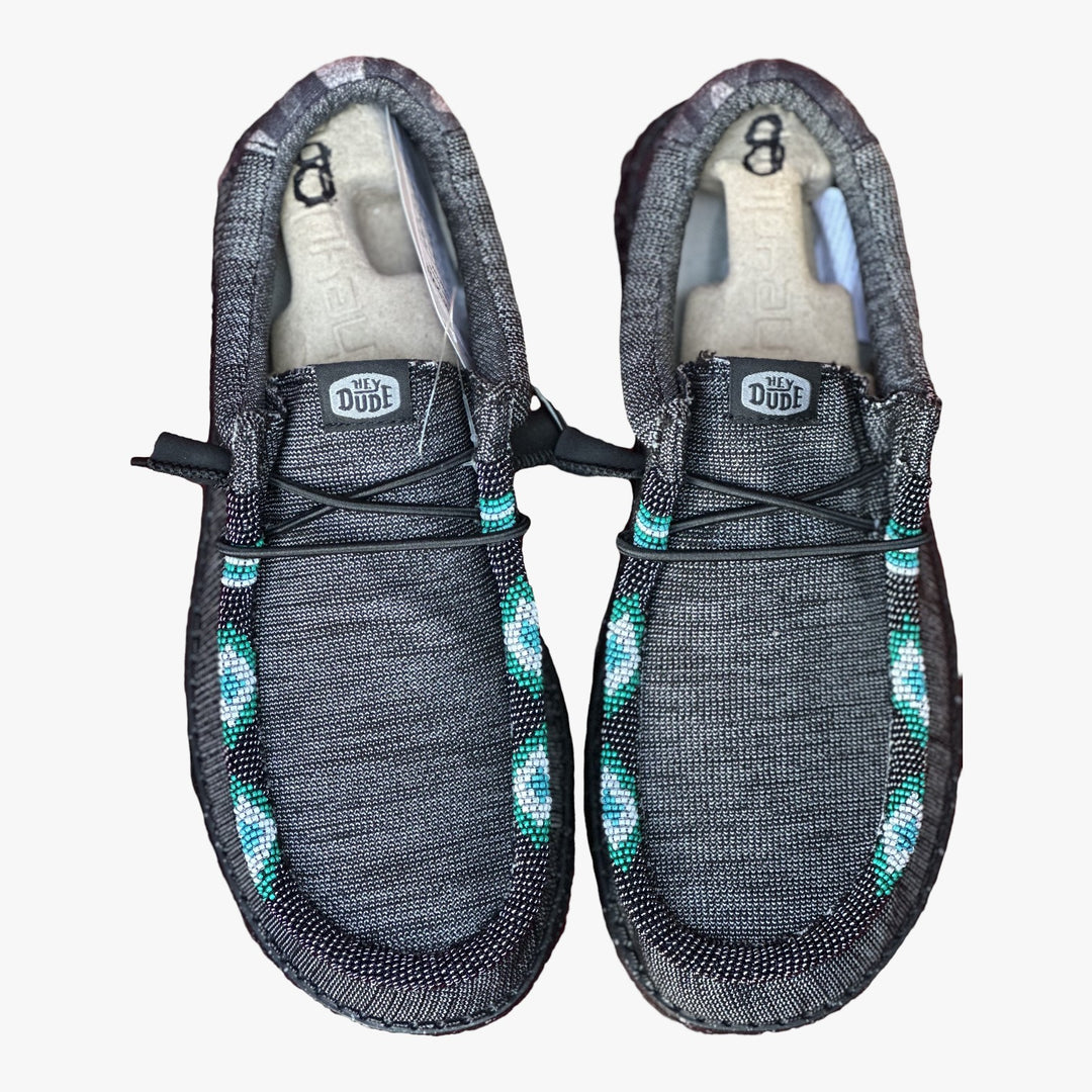 All Nations Designs &amp; More gray Hey Dude slip-on shoes featuring custom turquoise and white hand-beaded detailing.
