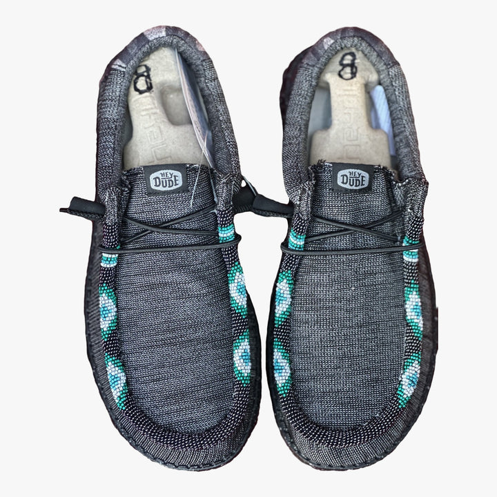 All Nations Designs &amp; More gray Hey Dude slip-on shoes featuring custom turquoise and white hand-beaded detailing.