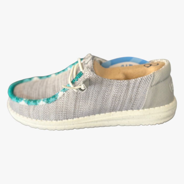 All Nations Designs &amp; More hand-beaded gray mesh slip-on shoes with turquoise and white beadwork detail.