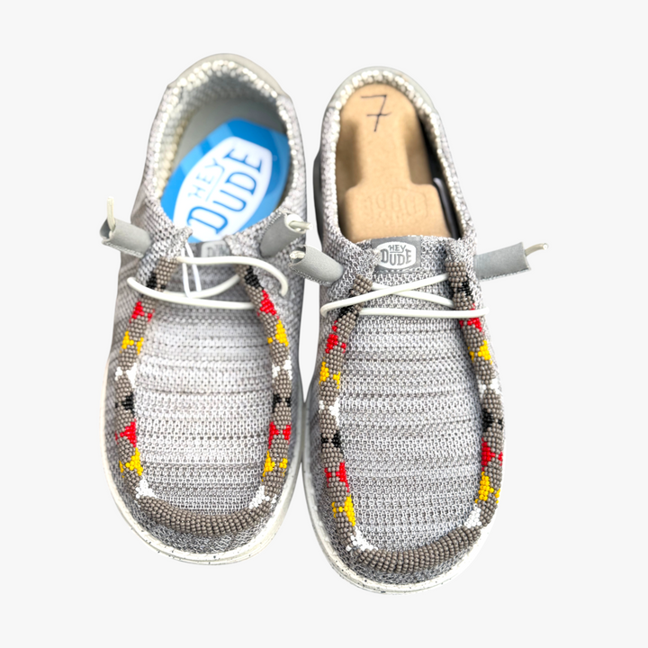 All Nations Designs &amp; More gray mesh Hey Dude slip-on shoes featuring unique hand-beaded western-inspired patterns.