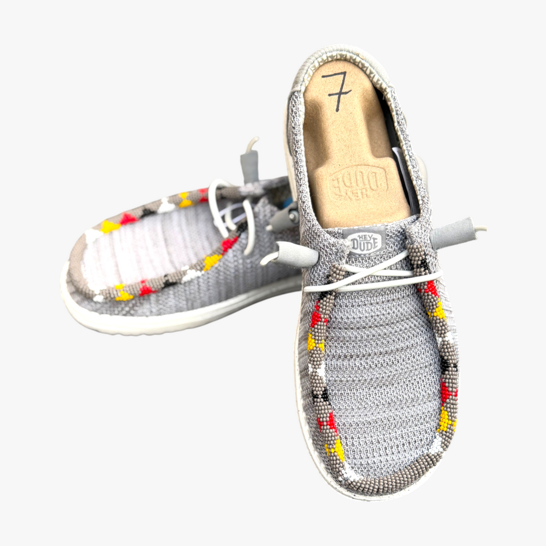 All Nations Designs &amp; More gray mesh Hey Dude slip-on shoes featuring unique, colorful hand-beaded western detailing.