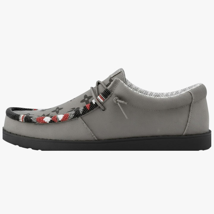 All Nations Designs &amp; More gray Hey Dude slip-on shoes featuring custom hand-beaded western patterns and paw prints.