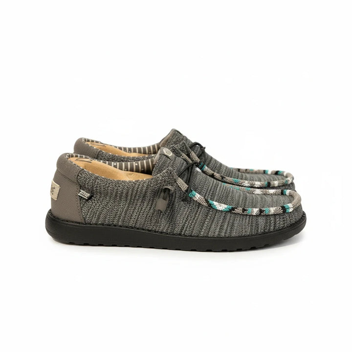 All Nations Designs &amp; More hand-beaded Hey Dude Wally Sox slip-on shoes in granite grey and black with western detail.