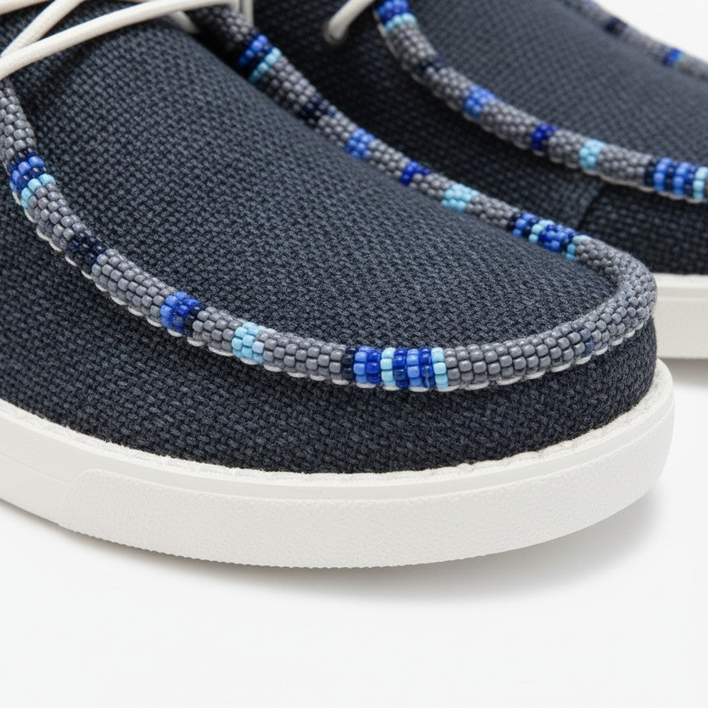 All Nations Designs &amp; More navy mesh Hey Dude slip-on shoes featuring intricate hand-beaded blue and grey trim.