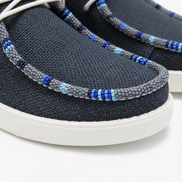 All Nations Designs &amp; More navy mesh Hey Dude slip-on shoes featuring intricate hand-beaded blue and grey trim.