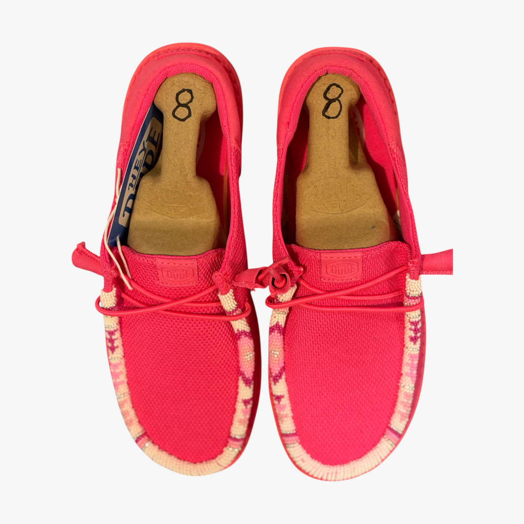All Nations Designs &amp; More hand-beaded electric pink Hey Dude mesh slip-on shoes with western-inspired beadwork.
