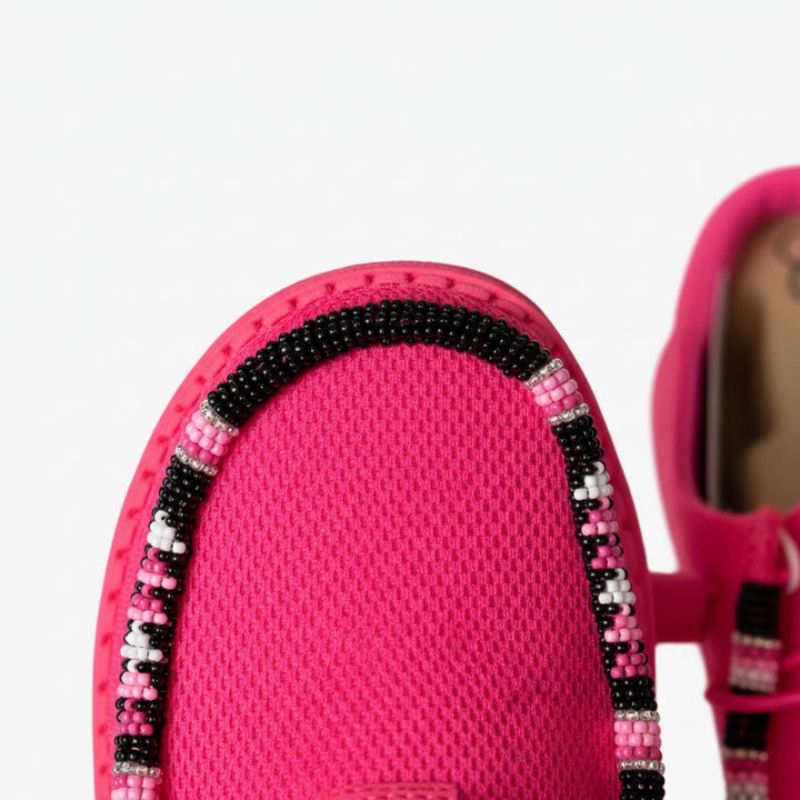 All Nations Designs &amp; More electric pink mesh slip-on shoes featuring intricate black, white, and pink hand-beaded trim.