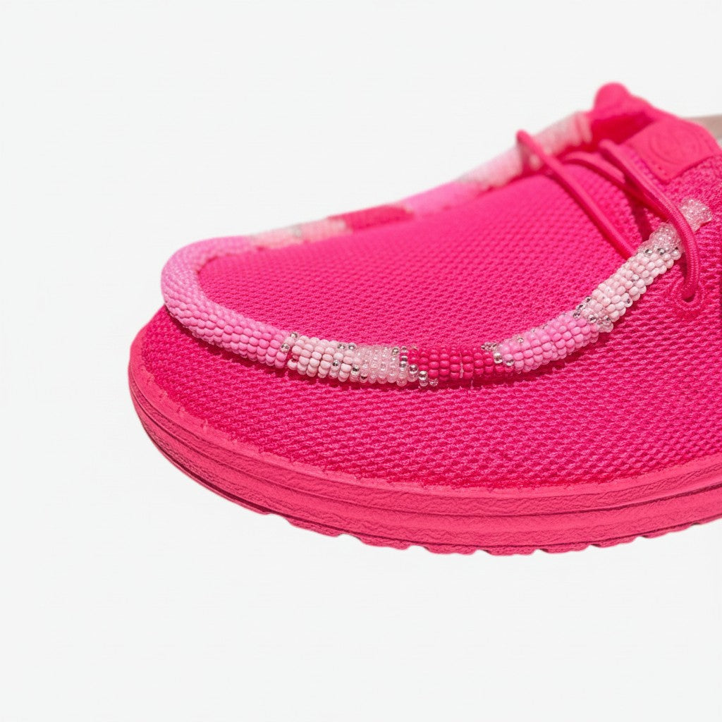 All Nations Designs &amp; More electric pink mesh Hey Dude slip-on shoes featuring custom hand-beaded trim detail.
