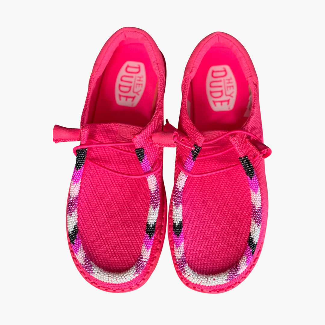 All Nations Designs &amp; More electric pink Hey Dude slip-on shoes featuring unique hand-beaded trim in a casual style.