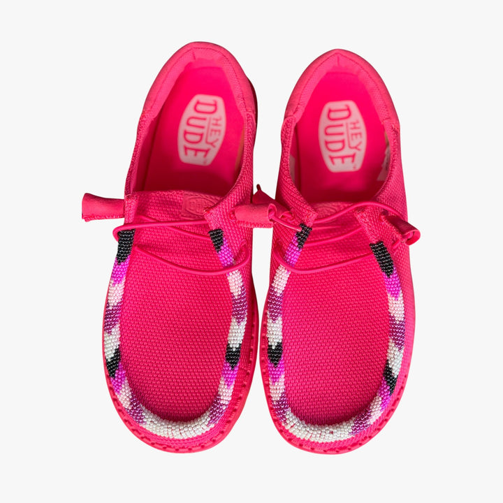 All Nations Designs &amp; More electric pink Hey Dude slip-on shoes featuring unique hand-beaded trim in a casual style.