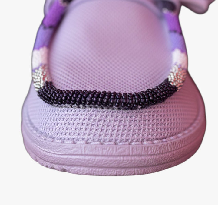 All Nations Designs &amp; More purple mesh Hey Dude slip-on shoes featuring custom hand-beaded detailing on the toe.