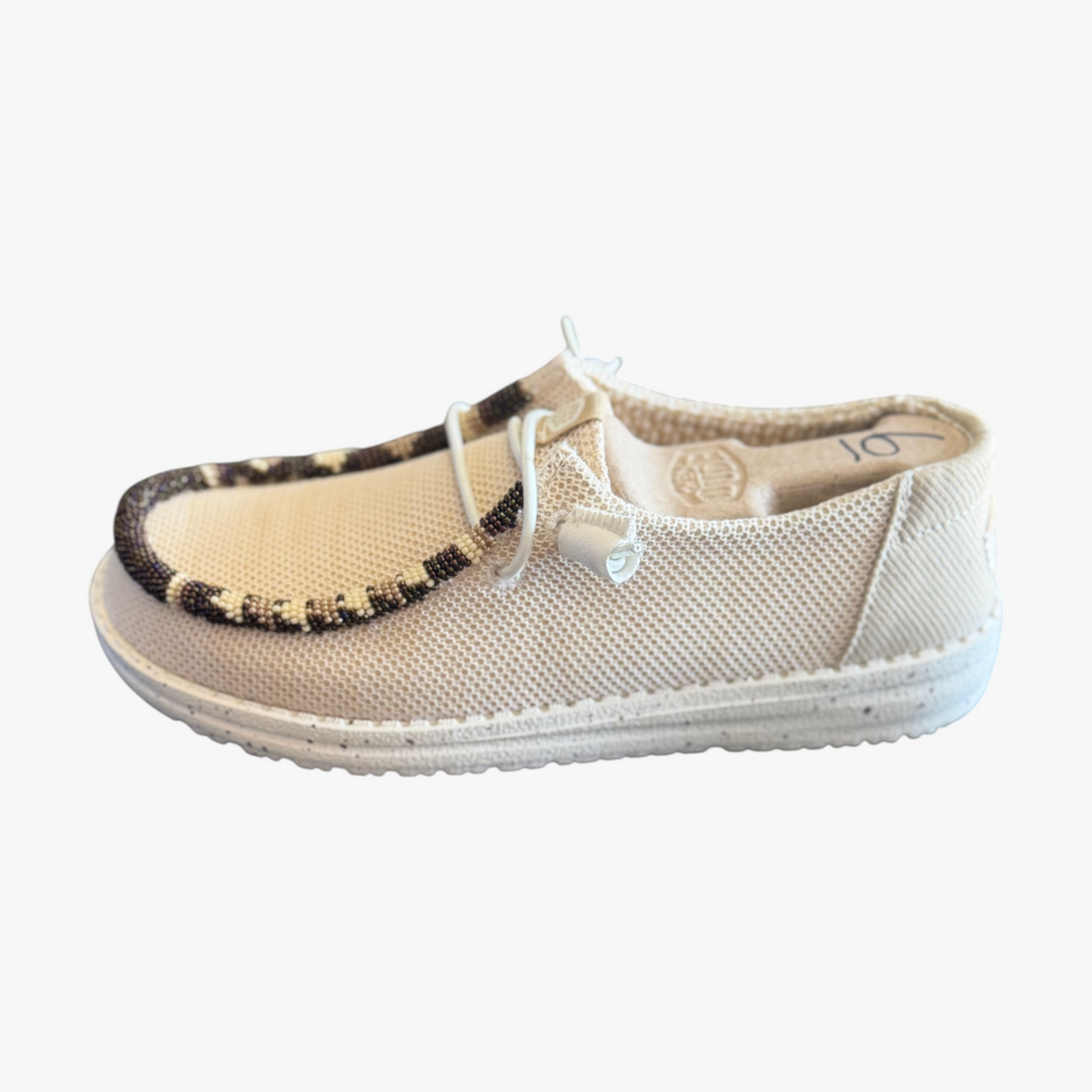 All Nations Designs &amp; More tan mesh Hey Dude slip-on shoes featuring unique hand-beaded detailing on the toe.