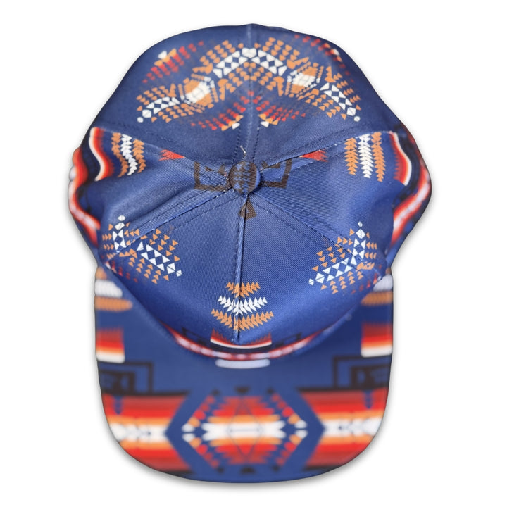 Top view of Blue Traditional southwest flat bill snapback hat with symmetrical geometric pattern details.
