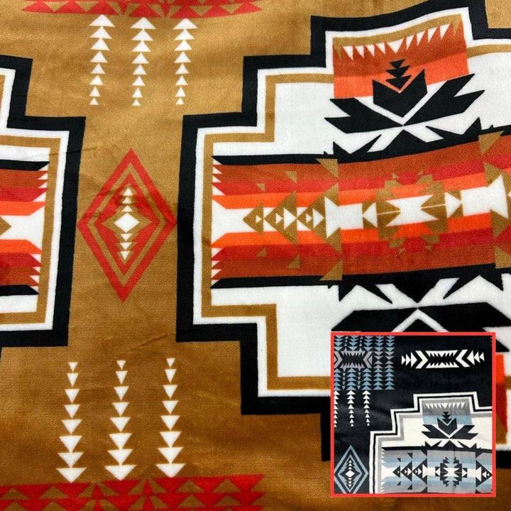 Buckskin Geo-Storm Reversible Native-Inspired Satin-Touch Blanket with vibrant Southwestern geometric designs.