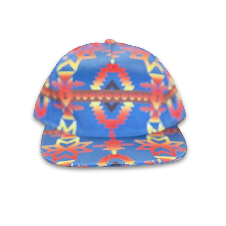 Canyon Sky southwest flat bill snapback hat featuring blue geometric western-inspired patterns shown from the front.