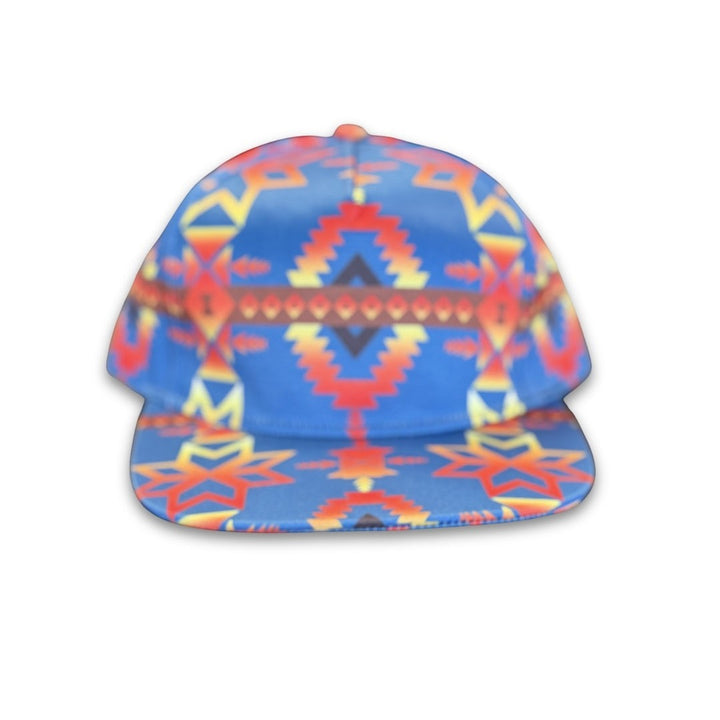 Canyon Sky southwest flat bill snapback hat featuring blue geometric western-inspired patterns shown from the front.