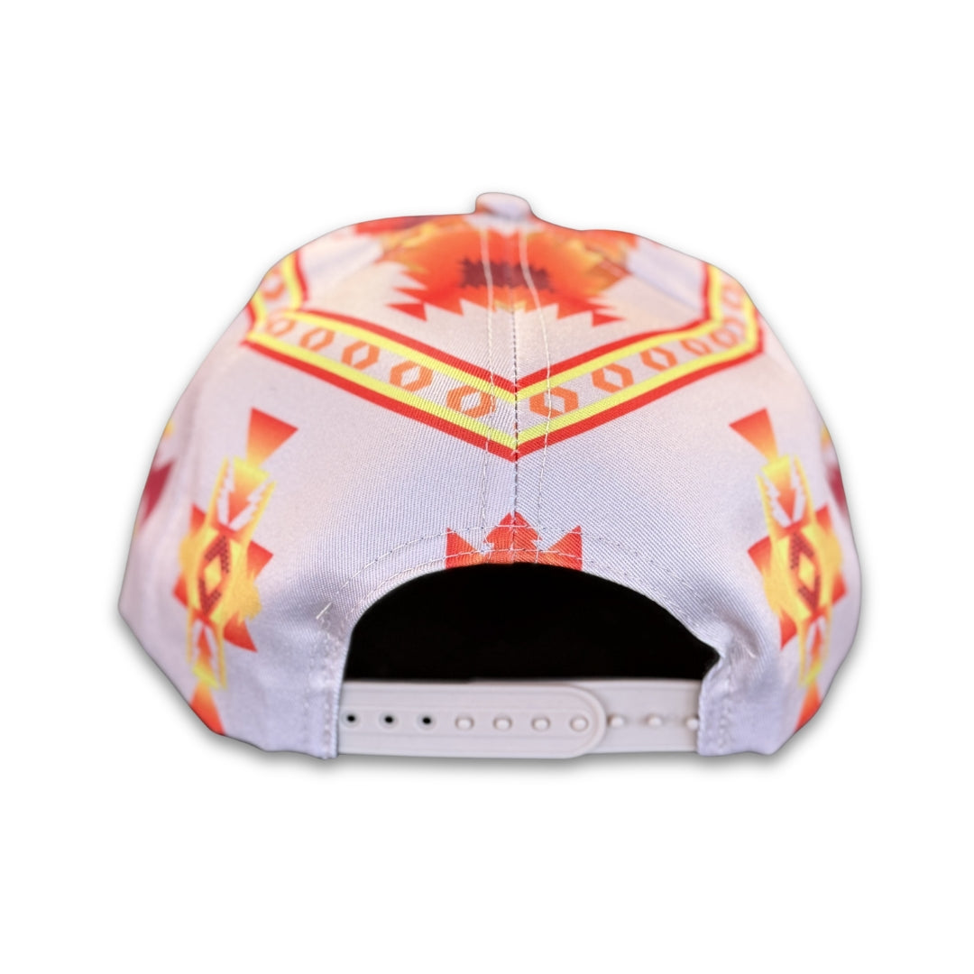 Back view of adjustable white snapback hat with southwest geometric tribal-inspired pattern and flat brim.