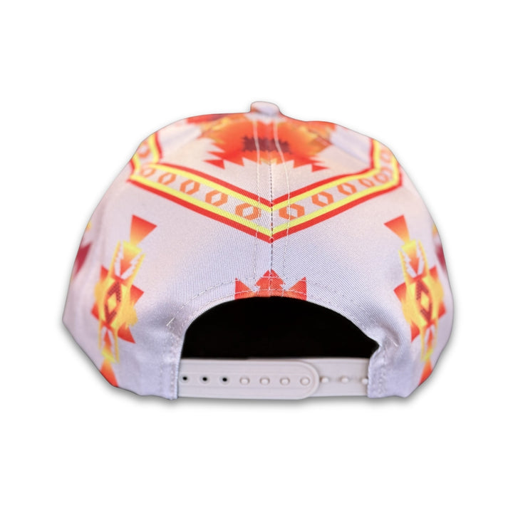 Back view of adjustable white snapback hat with southwest geometric tribal-inspired pattern and flat brim.