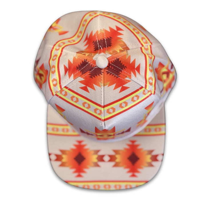Top view of white geometric patterned snapback hat with symmetrical southwest-inspired design details.