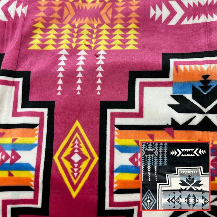 Hot Pink Geo-Storm Reversible Native-Inspired Satin-Touch Blanket with vibrant Southwestern geometric designs.