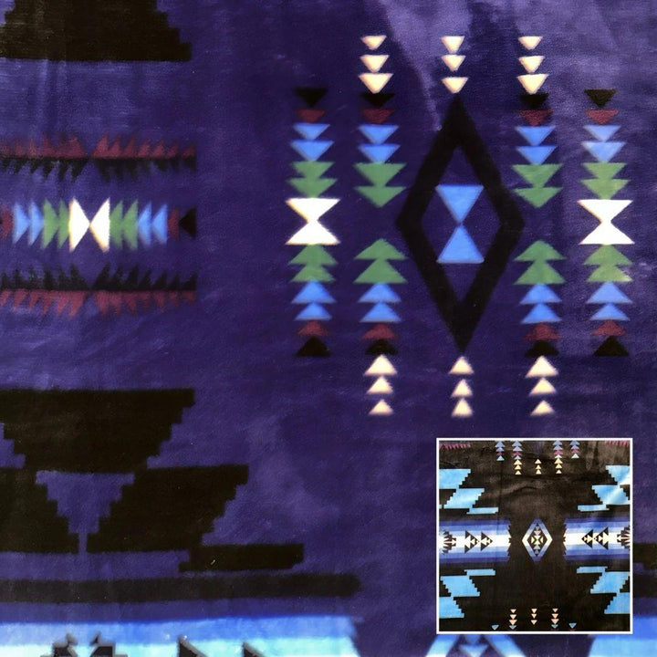 Navy Southwestern-style plush blanket with bold Native-inspired geometric diamond and stripe patterns.