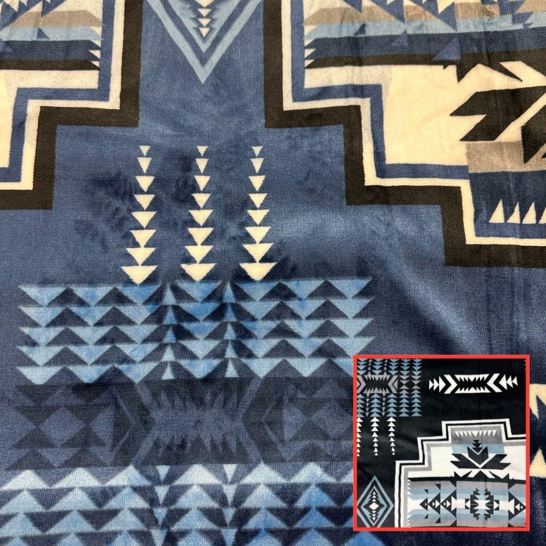 Navy Geo-Storm Reversible Native-Inspired Satin-Touch Blanket with vibrant Southwestern geometric designs.
