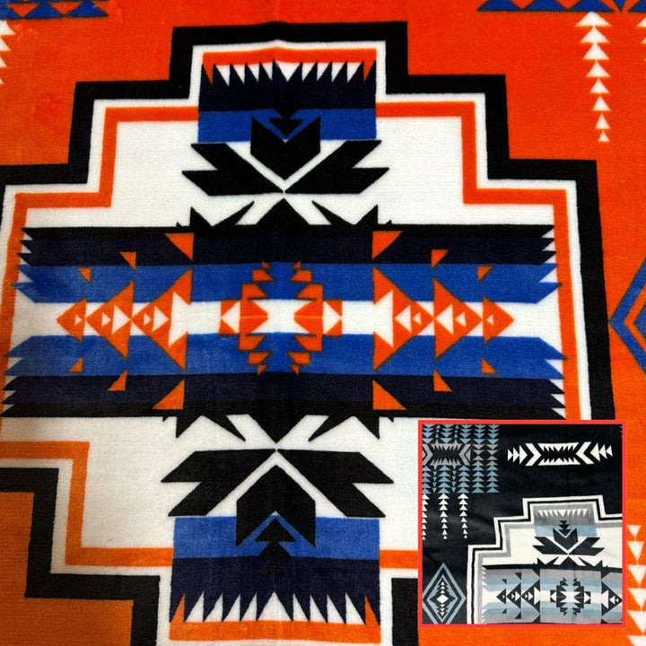 Orange Geo-Storm Reversible Native-Inspired Satin-Touch Blanket with vibrant Southwestern geometric designs.