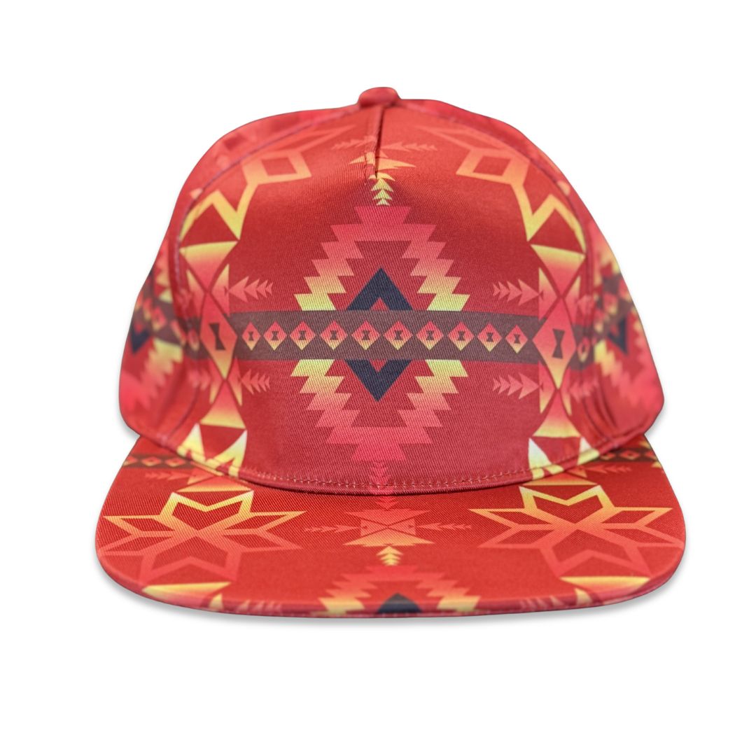 Red flat bill snapback hat with Native-inspired geometric southwest pattern and structured crown front view.
